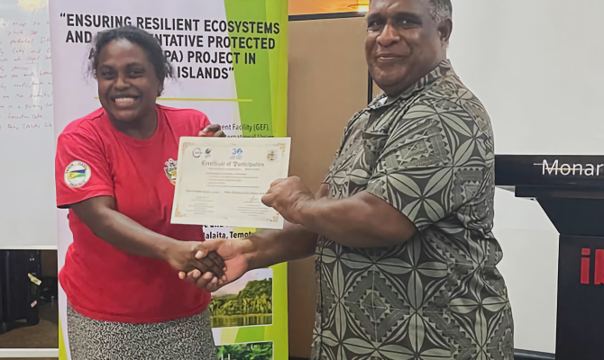 Chanel Iroi congratulates one of the participants.