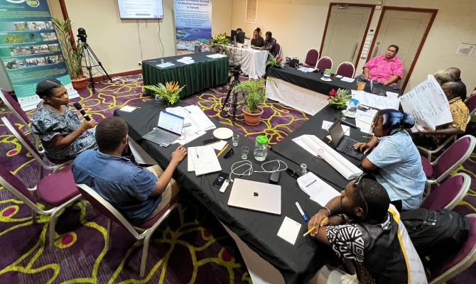 Stakeholders reviewing the Sarakata River Plan